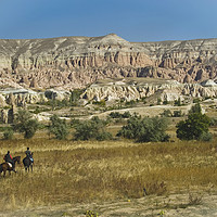 Buy canvas prints of Riding Through Cappadocia by Ian Lewis