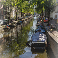Buy canvas prints of A Street In Amsterdam by Ian Lewis