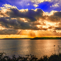Buy canvas prints of golden rays over falmouth bay  by keith sutton
