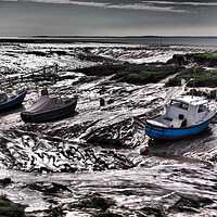 Buy canvas prints of Fishing boats in harbour at low tide by mark humpage
