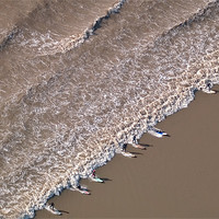 Buy canvas prints of Surfers on the Severn Bore aerial by mark humpage