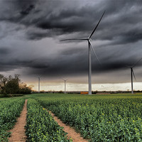 Buy canvas prints of Wind Turbines with clouds by mark humpage
