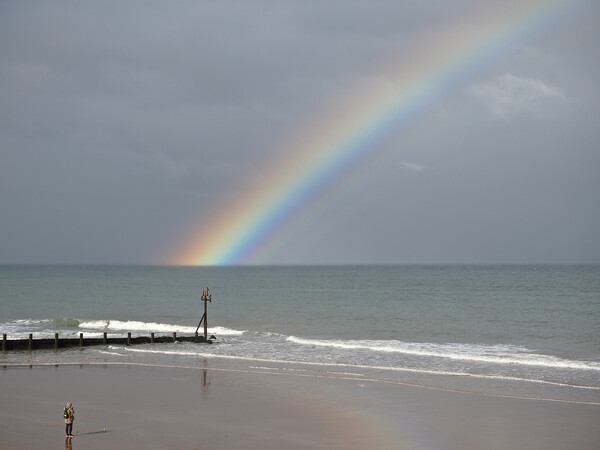 Rainbow over sea Picture Board by mark humpage
