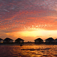 Buy canvas prints of Maldives sunset over water bungelows by mark humpage
