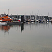Buy canvas prints of Lifeboat and sailing boats in Brixham marina by mark humpage