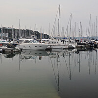 Buy canvas prints of Sailing boats and mast reflections, Brixham by mark humpage