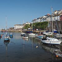 Buy canvas prints of Sailing boats moored in Brixham harbour by mark humpage