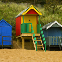 Buy canvas prints of Beach Huts at Wells Next to Sea 1 by Bill Simpson