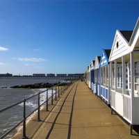 Buy canvas prints of Southwold Pier and Beach Huts by Bill Simpson