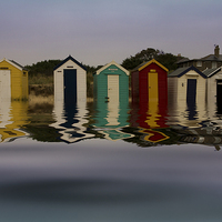 Buy canvas prints of Southwold Beach Huts Flood 1 by Bill Simpson