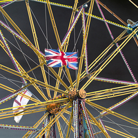 Buy canvas prints of Ferris Wheel and Flags by Bill Simpson