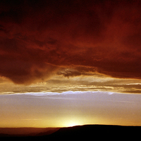 Buy canvas prints of Underneath Stormclouds: Sunset at Fish River Canyo by Carole-Anne Fooks
