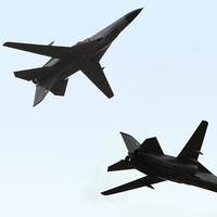 Buy canvas prints of Two  F111s in the Air by Carole-Anne Fooks