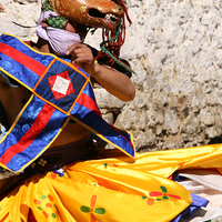 Buy canvas prints of  Masked Monk at the Tashiling Festival, Bhutan by Carole-Anne Fooks