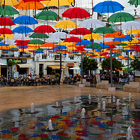 Buy canvas prints of Colorful Umbrellas Torrox Costa Del Sol Spain by Andy Evans Photos