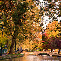 Buy canvas prints of Golden Autumnal Colors in Bourton-on-the-Water by Andy Evans Photos