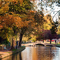 Buy canvas prints of Bourton on the Water Autumn Trees Cotswolds UK by Andy Evans Photos