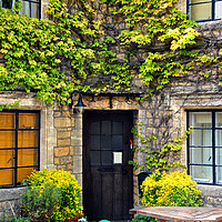 Buy canvas prints of Cotswolds Cottage Bourton on the Water UK by Andy Evans Photos
