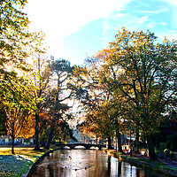 Buy canvas prints of Bourton on the Water Autumn Trees Cotswolds by Andy Evans Photos