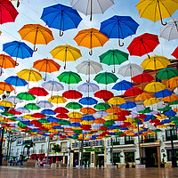 Buy canvas prints of Vibrant Umbrella Canopy in Torrox by Andy Evans Photos