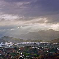 Buy canvas prints of Majestic Moorish Village Amidst Stormy Mountains by Andy Evans Photos