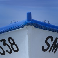Buy canvas prints of Blue Boat by Michelle Orai