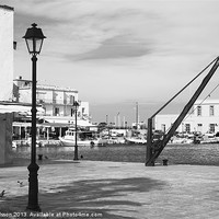 Buy canvas prints of Rethymno harbour mono by Rod Ohlsson