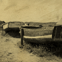 Buy canvas prints of Old Boats at Meneham by Ade Robbins