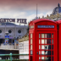 Buy canvas prints of Brighton Phone Boxes And Pier by Colin Williams Photography