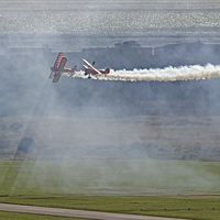 Buy canvas prints of  Through The Smoke - Wingwalkers - Shoreham 2014 by Colin Williams Photography