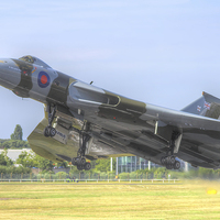 Buy canvas prints of  Vulcan Takes to the Sky - Farnborough 2014 by Colin Williams Photography
