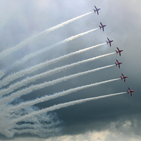 Buy canvas prints of  The Red Arrows Against A Cloudy Sky by Colin Williams Photography