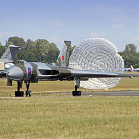 Buy canvas prints of  Avro Vulcan Landing Riat 2015 by Colin Williams Photography