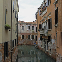 Buy canvas prints of Reflections in Venetian Canal by Tony Murtagh