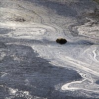Buy canvas prints of Swirling Patterns on Scottish River by Colin Tracy