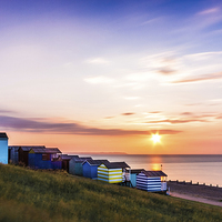 Buy canvas prints of Beach Huts at Sunset by Ian Hufton