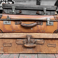 Buy canvas prints of Vintage Suitcases Stacked High by John Hastings