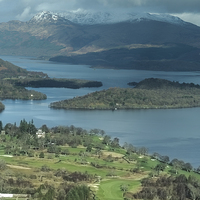 Buy canvas prints of Serene Beauty of Loch Lomond Golf Club by John Hastings