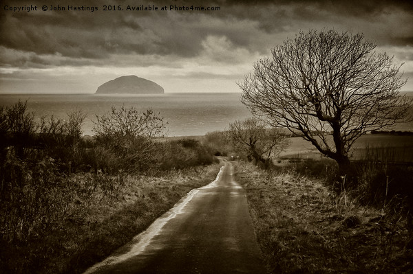 Ancient volcanic island off Scottish coast Picture Board by John Hastings