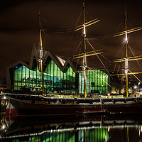 Buy canvas prints of Illuminated Sailing Ship on River Clyde by John Hastings