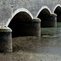 Buy canvas prints of Looe Bridge Arches by Helen Northcott