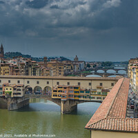 Buy canvas prints of Ponte Vecchio under a Stormy Sky by Nick Hirst