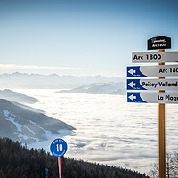 Buy canvas prints of Les Arcs above a lake of clouds by Nick Hirst