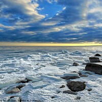 Buy canvas prints of Icy Lake Ontario Sunset. by Gary Barratt