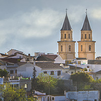 Buy canvas prints of Twin spires of Orgiva town church, in the Alpujarras Spain by Fine art by Rina