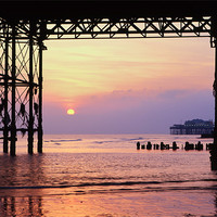 Buy canvas prints of West Pier from under Palace Pier, Brigton by Maggie McCall