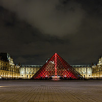 Buy canvas prints of The Louvre at night by Maggie McCall