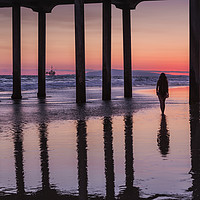 Buy canvas prints of Huntingdon Beach Pier Silhouette at sunset by Maggie McCall