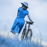 Buy canvas prints of woman with bicycle in field by Maggie McCall