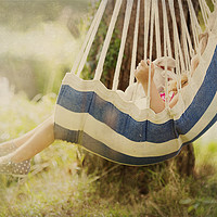 Buy canvas prints of Little Girl  in Swing by Maggie McCall